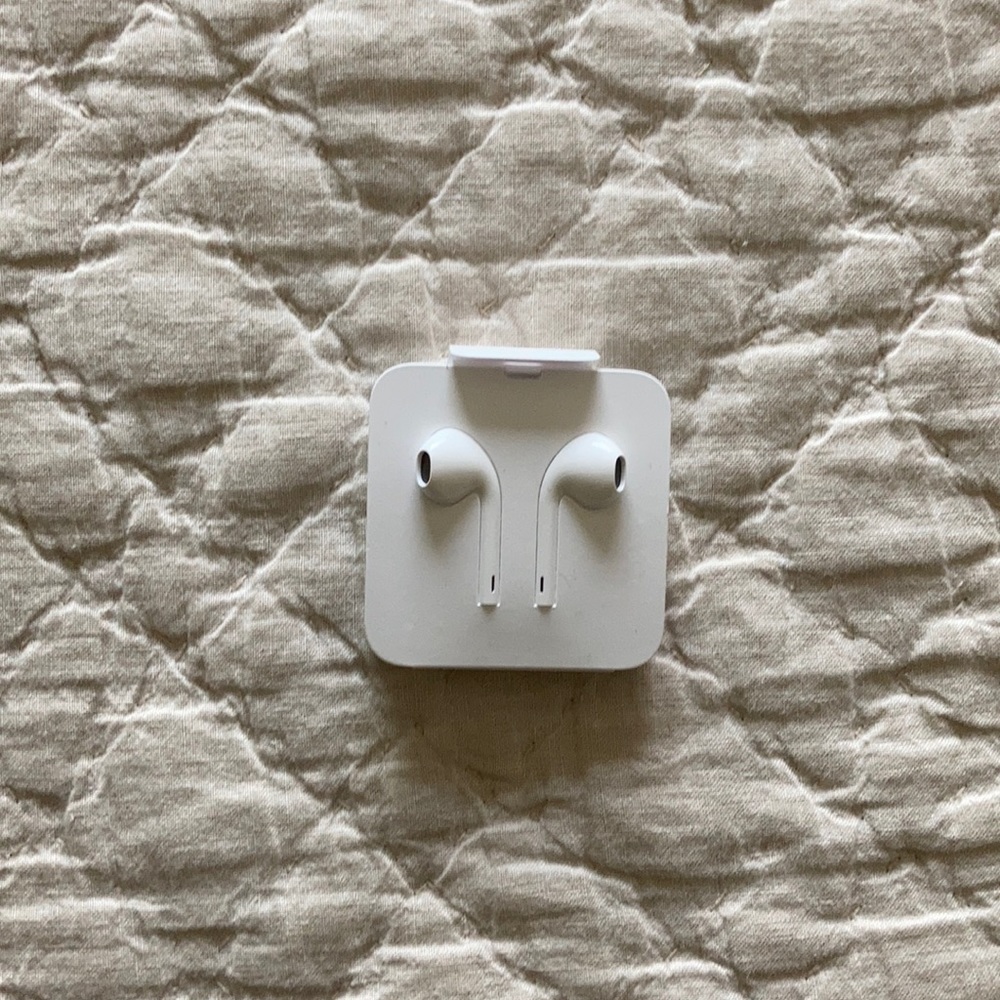BRAND new Apple headphones